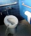 Locked toilet seat